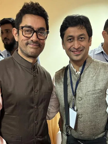 It was a privilege to collaborate with Aamir Khan and the Paani Foundation. Here I am with him, discussing the giant puppets we designed to tell the powerful story of farmers' struggles and triumphs at the Farmer Cup 2023.