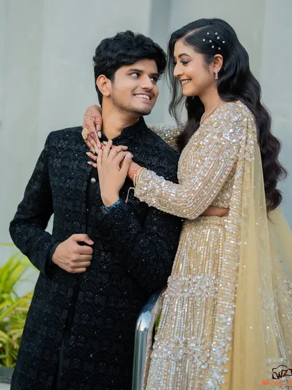 A stylish portrait of Apoorv and Shikha. Her embrace from behind creates a sense of connection and intimacy in this beautifully posed shot.