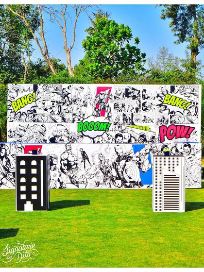 This custom-designed comic strip wall served as a massive, interactive art piece for the party. It provided a fantastic backdrop and reinforced the fun, graphic style of the superhero theme.