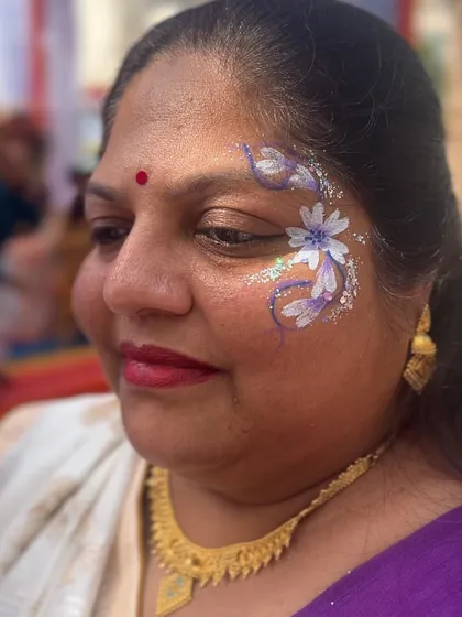 Another beautiful aunty enjoying my art. This delicate floral design with a touch of glitter suited her so perfectly.