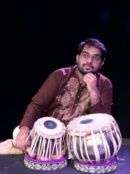 A pensive portrait with my tabla. I am always thinking about rhythm and capturing the beauty of life, one beat at a time.