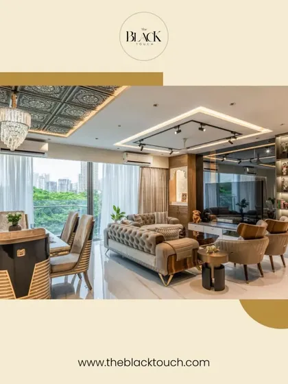 A different angle of the premium living room, showcasing the tufted sofa and track lighting system. The large windows allow for plenty of natural light, enhancing the feeling of spaciousness.