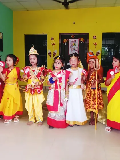 A lineup of students in various mythological costumes, ready for their school performance. You can see the variety I offer, from sarees to dhotis and character-specific outfits.