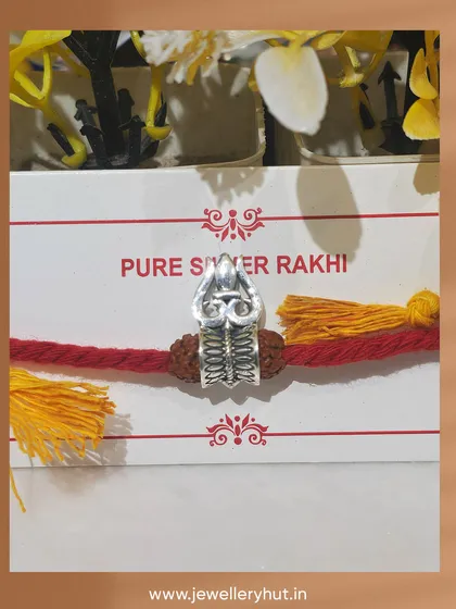 A powerful Trishul and Rudraksha Rakhi, crafted in pure silver for a brother who is a devotee of Lord Shiva.