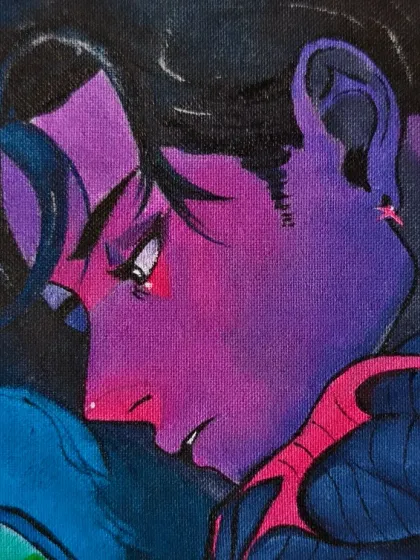 A close-up of the male character, bathed in the dramatic purple and blue light from his screen. This view shows the stylized shading and sharp line work characteristic of the manga art style.