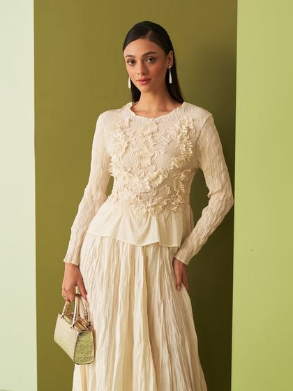 This curation is all about accessible luxury. It features a range of stylish and comfortable prêt-à-porter pieces, including kurtas, tunics, dresses, and co-ord sets that bring a touch of elegance to any casual or semi-formal occasion.