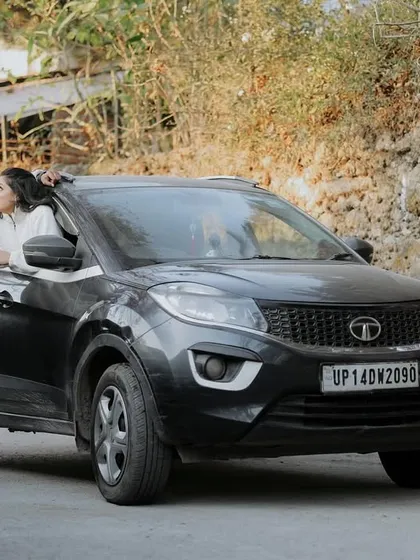 A fun, road trip themed shot with the couple and their car in the hills. This tells a story of adventure and their journey together.