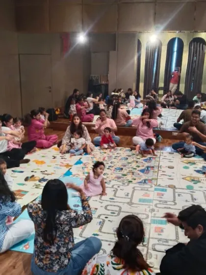 A wide view of our class circle, filled with families making music together. This setup ensures everyone feels included and can interact easily during our sessions in Kandivali and Goregaon.