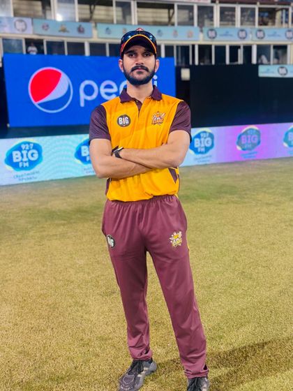 A moment of focus on the cricket ground before a match. My role is to keep the athletes physically and mentally prepared for high-pressure situations.