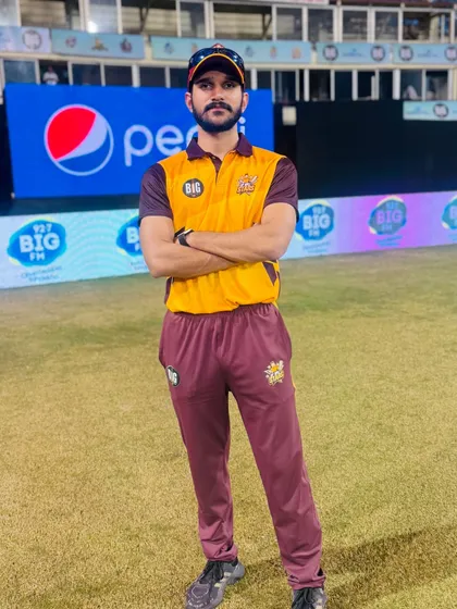 A moment of focus on the cricket ground before a match. My role is to keep the athletes physically and mentally prepared for high-pressure situations.