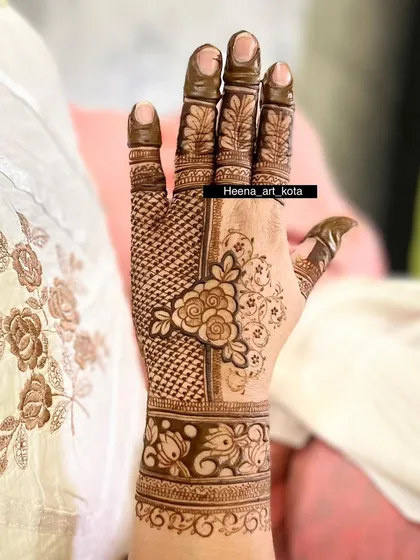A modern take on a back-hand design. It combines a dense floral pattern on one side with a clean net pattern on the other, creating a stylish contrast.