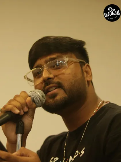 A performer sharing his heart at our LIT-MIC open mic event. We provide the stage, you provide the talent.