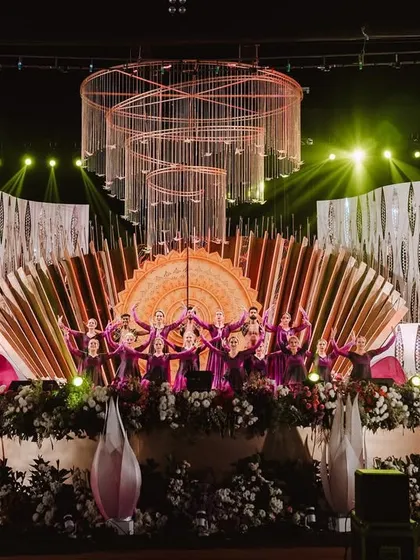 A grand entry that was nothing short of a fairytale, with a massive, ornate stage and a full troupe of professional dancers.