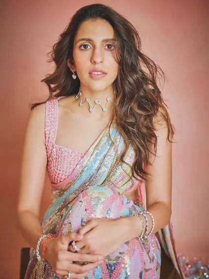 This multi-colored sequin saree by Manish Malhotra is all about fun and glamour. The pastel rainbow hues make it a perfect outfit for a sangeet or a festive party.