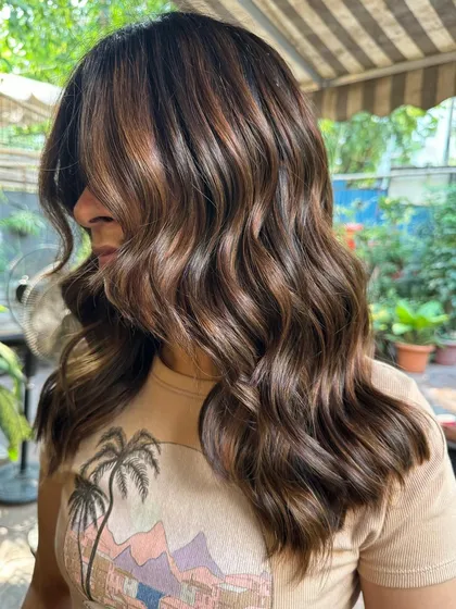 A side view of these beautiful caramel highlights. The non-bleach color looks natural and grows out seamlessly.