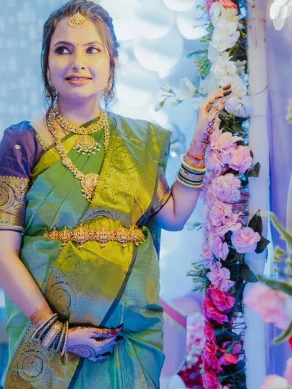 Your special moments deserve a special sparkle. This happy client is glowing at her baby shower in a beautiful South Indian temple jewellery set, proving that renting is a perfect option for all of life's celebrations.