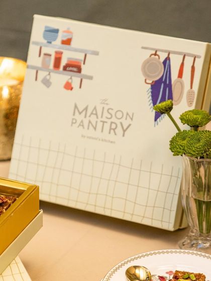The elegant design of my Maison Pantry packaging. The clean, illustrated box design reflects the artisanal quality of the handcrafted sweets and savories contained within.