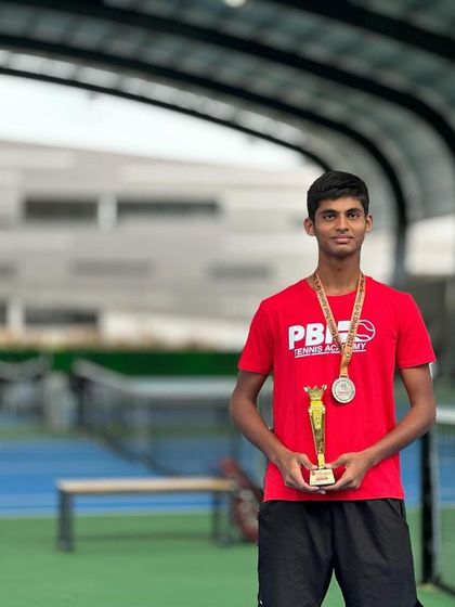 Our junior player Naishik Reddy, showcasing his trophy and medals after two amazing weeks in Bangladesh, where he reached back-to-back doubles finals.