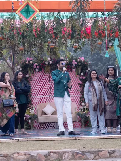 Getting the whole family involved in the fun on stage. These collective moments are what make Indian weddings so special.