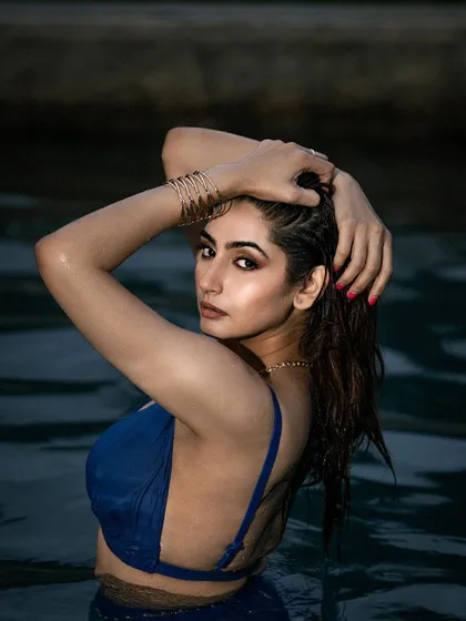 This editorial-style pool shoot uses dramatic, low-key lighting to create a moody and captivating image. It demonstrates my ability to work in different environments to produce unique and artistic fashion photographs.