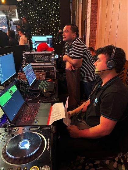 Our team at the DJ and lighting console for the MakeMyTrip Red Carpet Awards. We manage both the formal award segments and the high-energy entertainment portions of the evening.