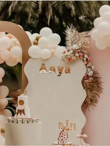 A beautiful boho-chic setup for a sweet first birthday. This design uses a soft, neutral color palette, organic balloon arches, and delicate dried florals to create a warm, stylish, and modern celebration for a special milestone.