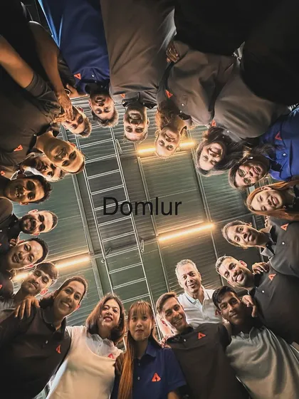 The smiling faces of our Domlur team. We are proud of the strong, collaborative culture we have built across all our locations.