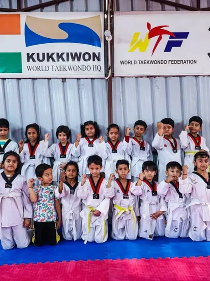 Another proud group photo of our youngest students in the dojang.