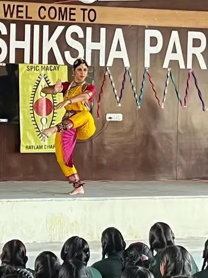 A dynamic pose captured during a workshop demonstration for school students. In these sessions, I break down the elements of Bharatanatyam, explaining the stories, expressions, and rhythms to make the art form engaging and understandable for a new audience.