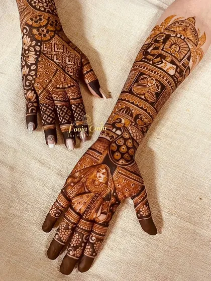 A closer look at the front-hand design for my NRI bride from Dubai, featuring a beautiful portrait of the bride.