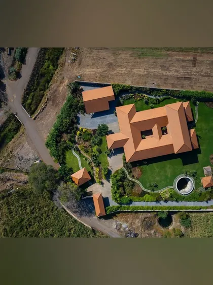 An aerial perspective of a large-scale institutional project, showcasing how I integrate manicured lawns, curving pathways, and dense green belts with the property's architecture. This view demonstrates my capability in master planning and executing complex, large-format landscape designs.