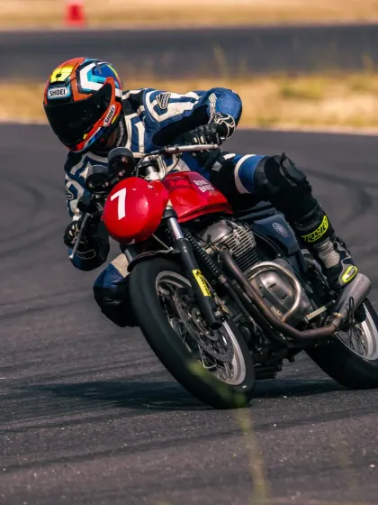 A rider perfectly executing a corner. This is the result of dedication and expert coaching.