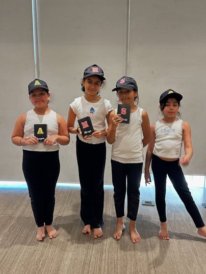 A group of proud young yogis from our International Yoga Day celebration. We are dedicated to passing on India's gift of yoga to the next generation in a way that is fun and meaningful.