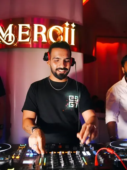 A smiling shot from behind the console at Mercii. Loving every minute of the party.