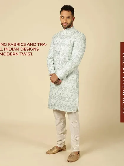 Dress to impress with this mint green Indo-Western kurta. Featuring traditional Indian designs with a modern twist, it's a statement of subtle elegance.