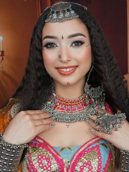 A Navratri special look created at our academy. This showcases the festive and traditional makeup styles we teach, complete with intricate details and authentic jewelry.