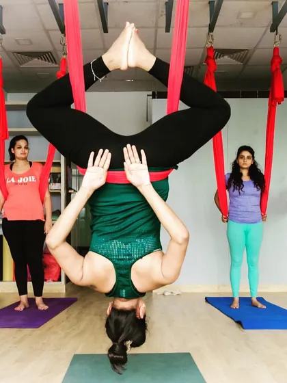 I am always there to spot and guide my students, especially when they are learning new inversions. This back straddle inversion is a great way to build confidence.