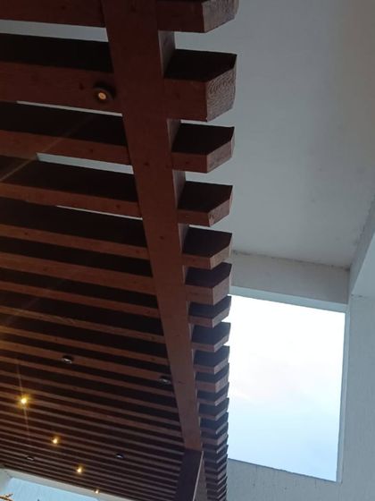 A close-up of the louvered ceiling detail on one of our pergolas, with integrated lighting. This showcases the quality craftsmanship and attention to detail in our work.