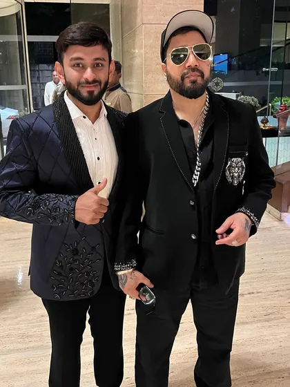 Another shot with Mika Singh, capturing the post-event buzz. My experience includes managing the flow of large scale music events and artist interactions.