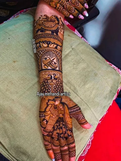 This full-arm design combines multiple story elements. It includes a bride and groom portrait, a doli scene, and traditional animal motifs like elephants and peacocks.