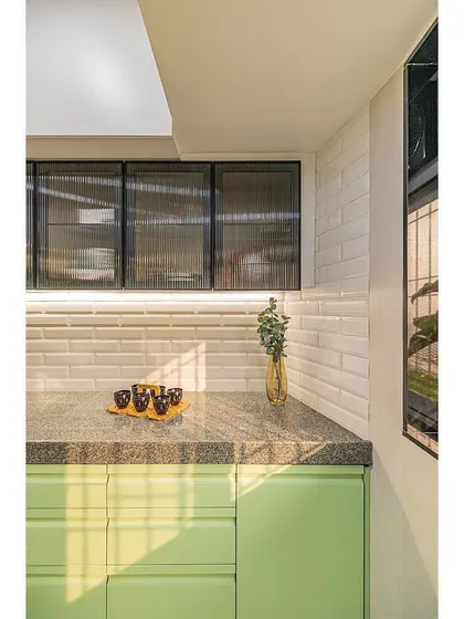 Another detail shot of the sunlit kitchen corner, showing how light plays on the different surfaces and textures.