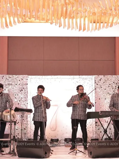 A soulful instrumental band sets a tone of pure elegance for a milestone 75th-anniversary celebration. We source and manage a diverse range of musical talent, from classical ensembles to contemporary bands, to create the perfect ambiance for any sophisticated gathering.