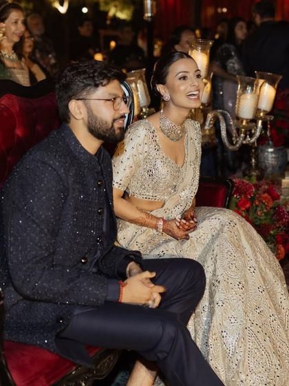 A happy, candid shot of the couple enjoying their Sangeet night together.