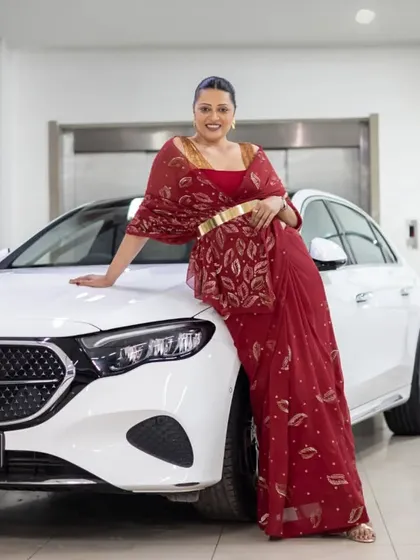 The modern drape of this Ravi Bajaj saree, with its cinched waist and elegant fall, is perfect for a high-profile event.