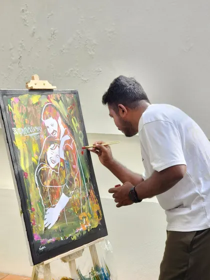 Here I am in my element, capturing the energy of the event. I paint live on-site, translating the sounds, colors, and emotions of the moment directly onto the canvas with each brushstroke.
