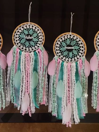We love creating sets for friends or family. These four custom pastel name dreamcatchers were made as return gifts, each one personalized to make the recipient feel special.