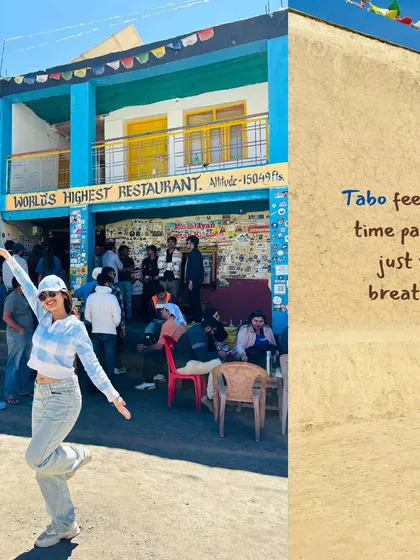 A traveler at the world's highest restaurant in Komic. Stopping for a meal or chai at these unique spots is all part of the authentic Spiti experience.
