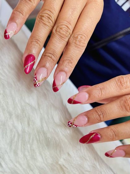 Another angle of the festive red and gold manicure, showing the beautiful mix of patterns and textures.