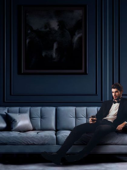 The epitome of luxury and professionalism. This image of a well-dressed individual in a sophisticated setting reflects the target audience and lifestyle of Saya Biztop's business class suites.