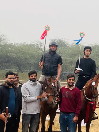 Our victorious riders and their proud supporters after a successful outing at the Junior National Equestrian Championship. The lances and medals are proof of their skill in tent pegging.
